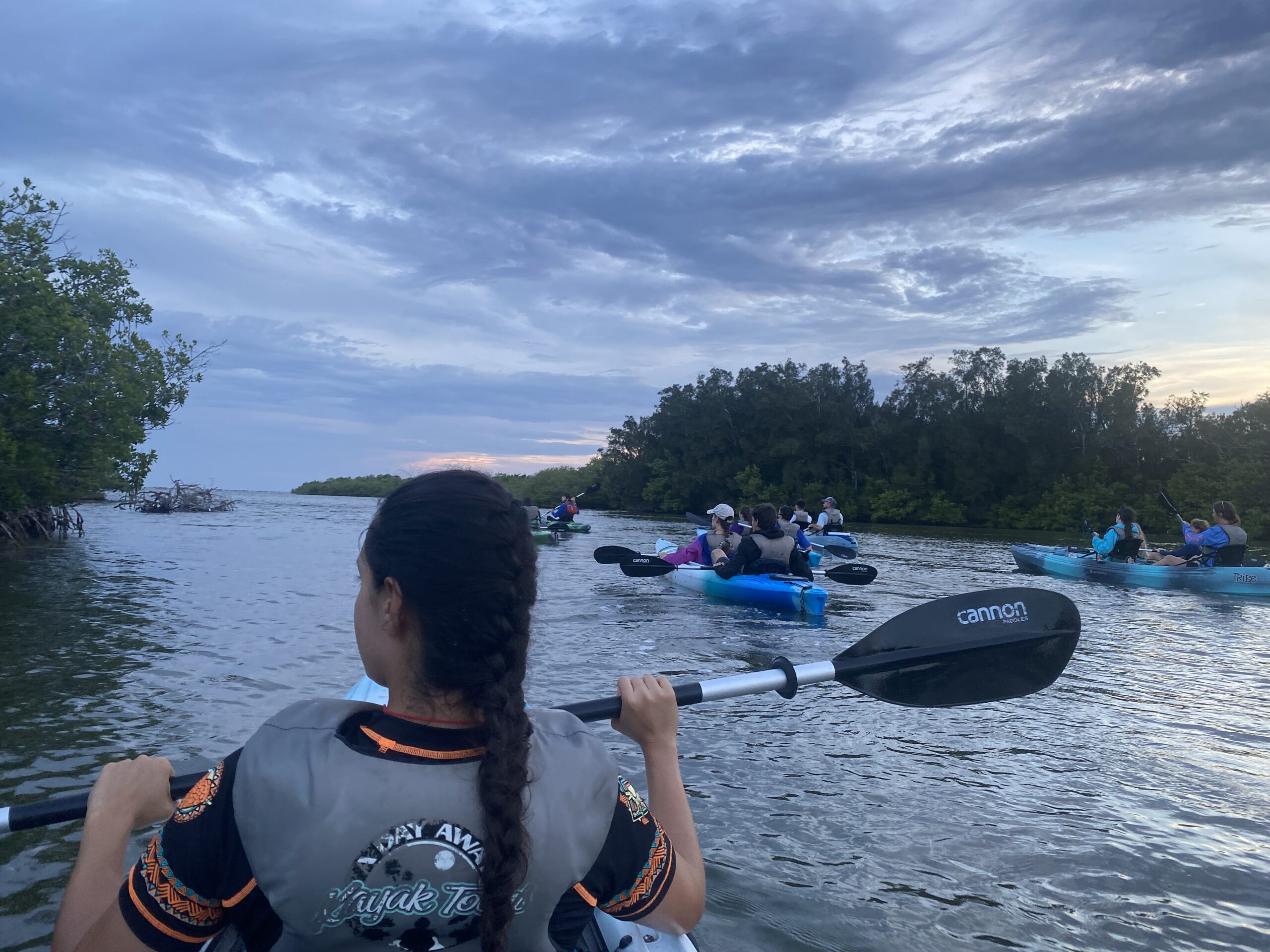 girl Bioluminescent Kayaking in florida