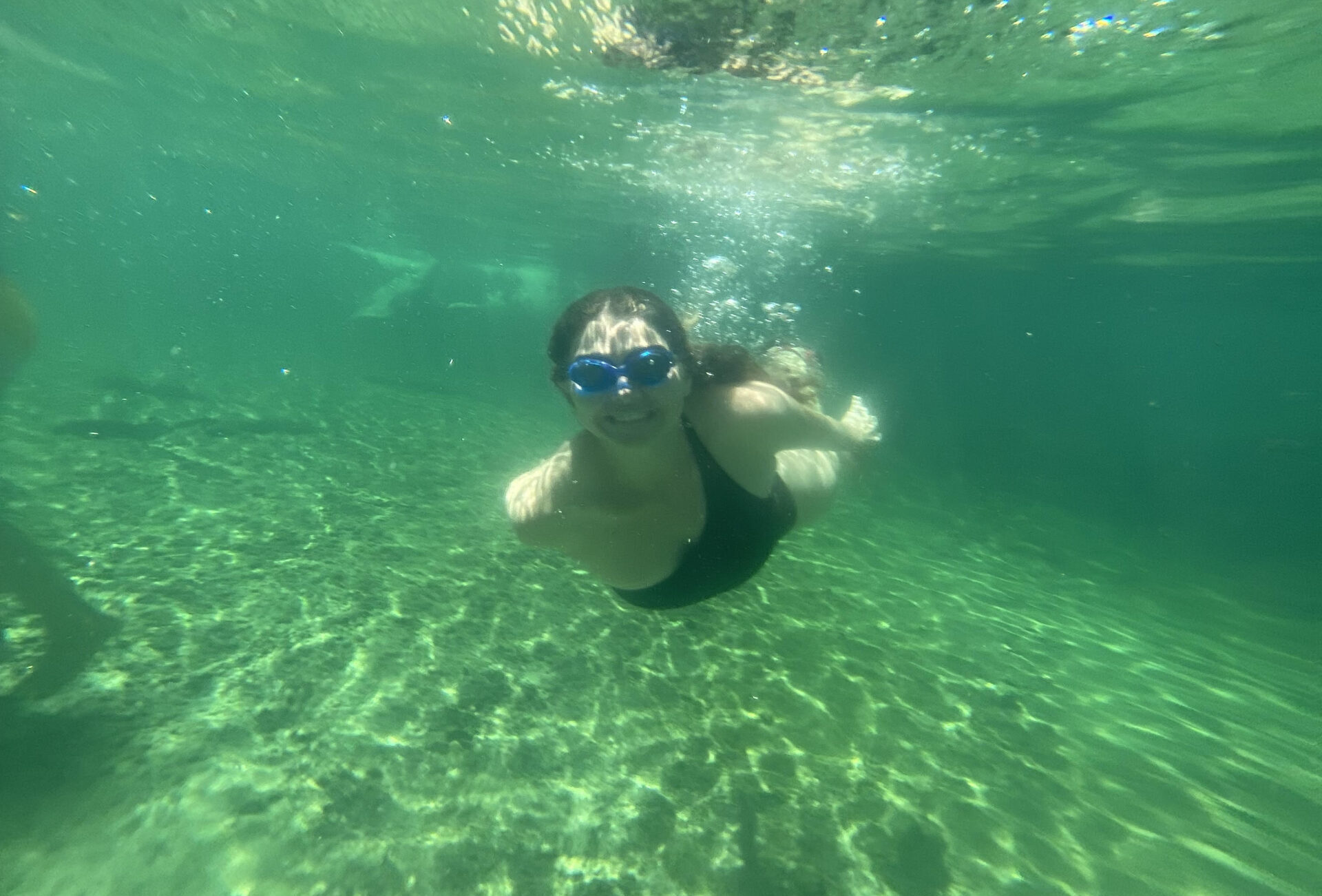 girl snorkeling at blue spring state park