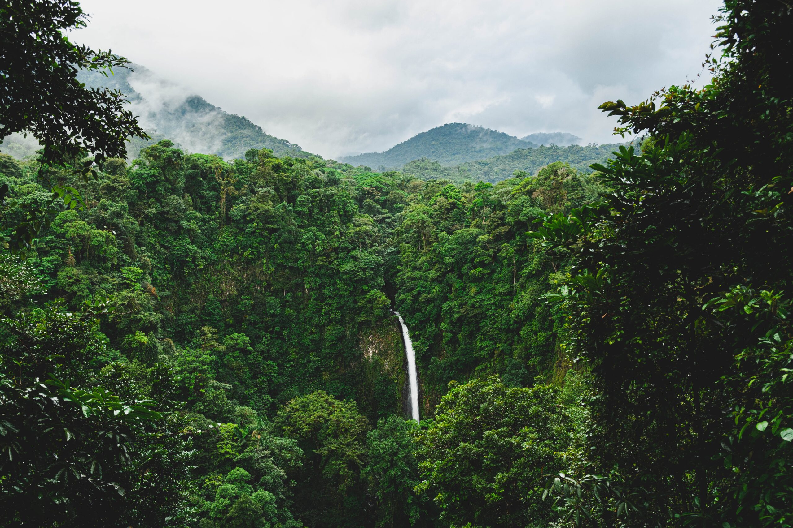 rainforest with waterfall in the mountains - best countries for solo female travel