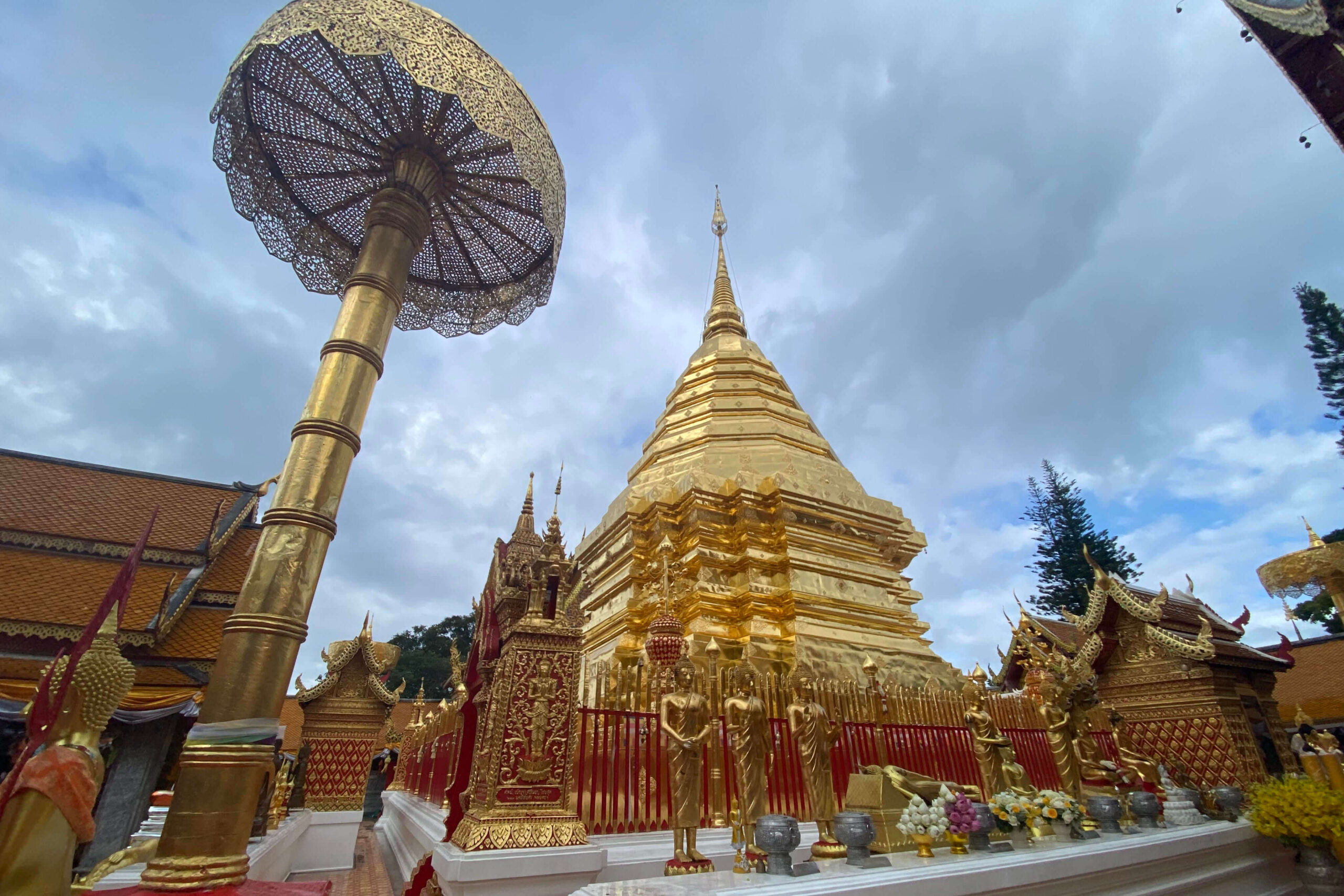 buddhist temple covered in Gold with details - Doi Suthep - beautiful places in thailand