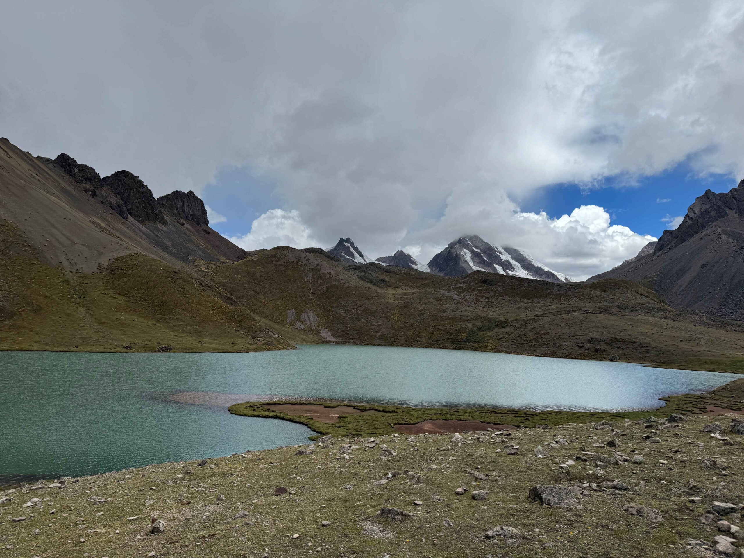 mountains and beautiful lake with clouds