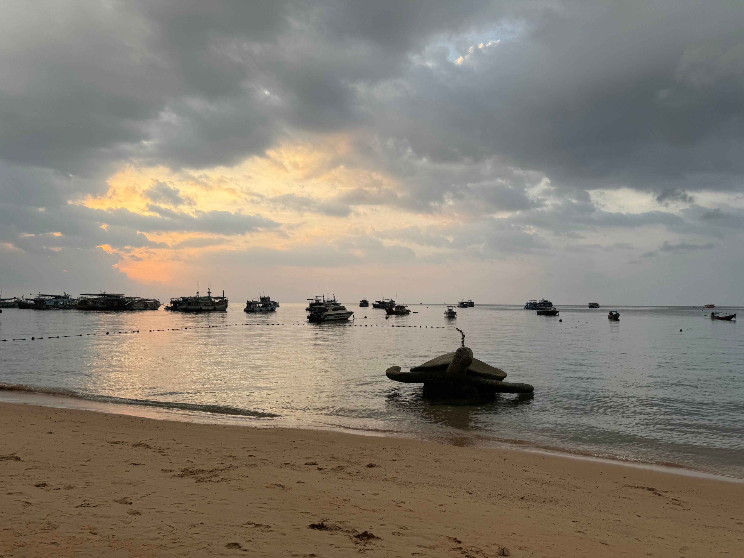 island views of the beach and ocean at sunset