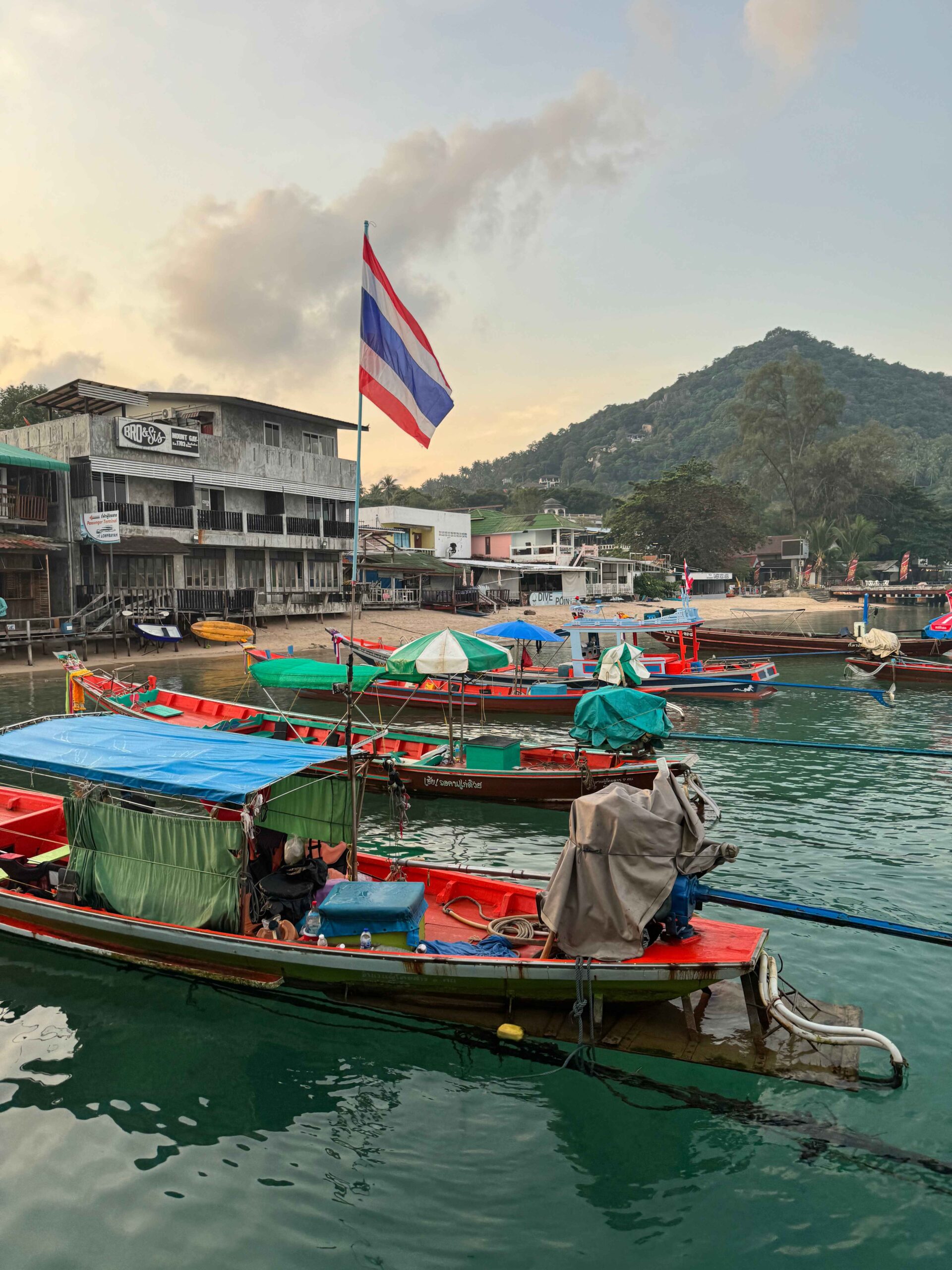 bangkok to koh tao - ferry pier with boats