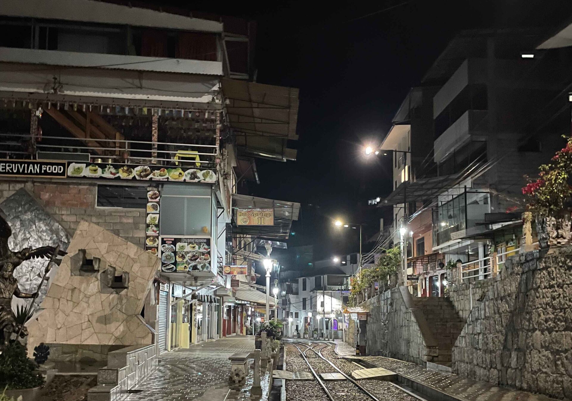 town at night with railroad from cusco to machu picchu