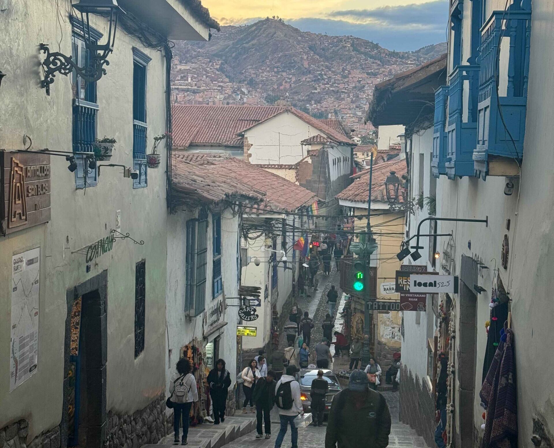 cusco city street with mountain views - 1 day in cusco itinerary