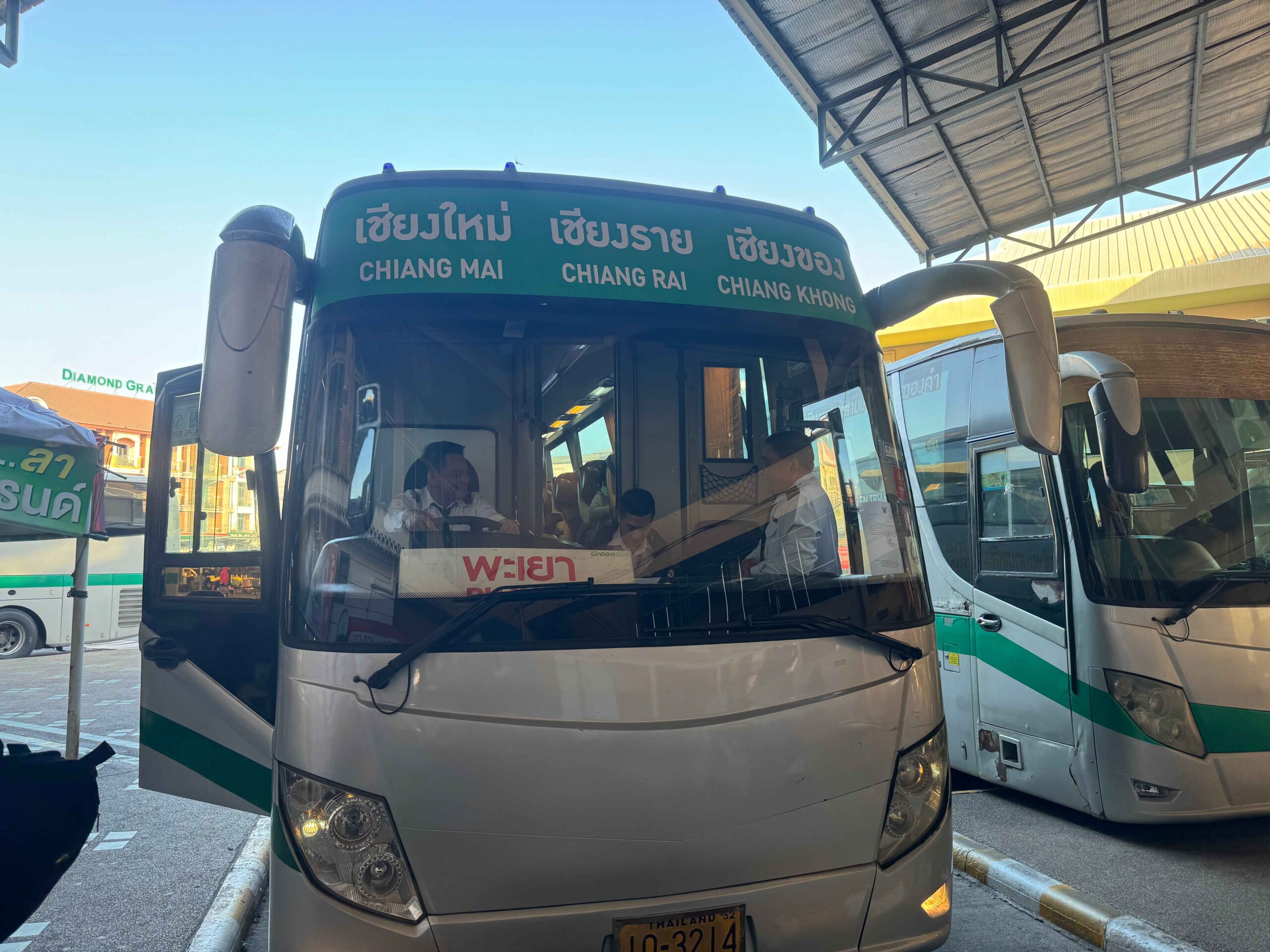 bus terminal in thailand with bus from Chiang Mai to Chiang Khlong