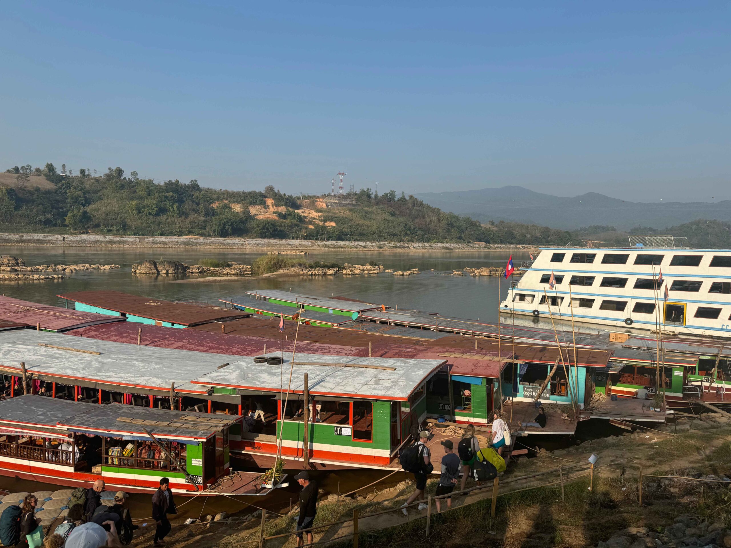 Slow boat in Huay Xai parked on the river bank