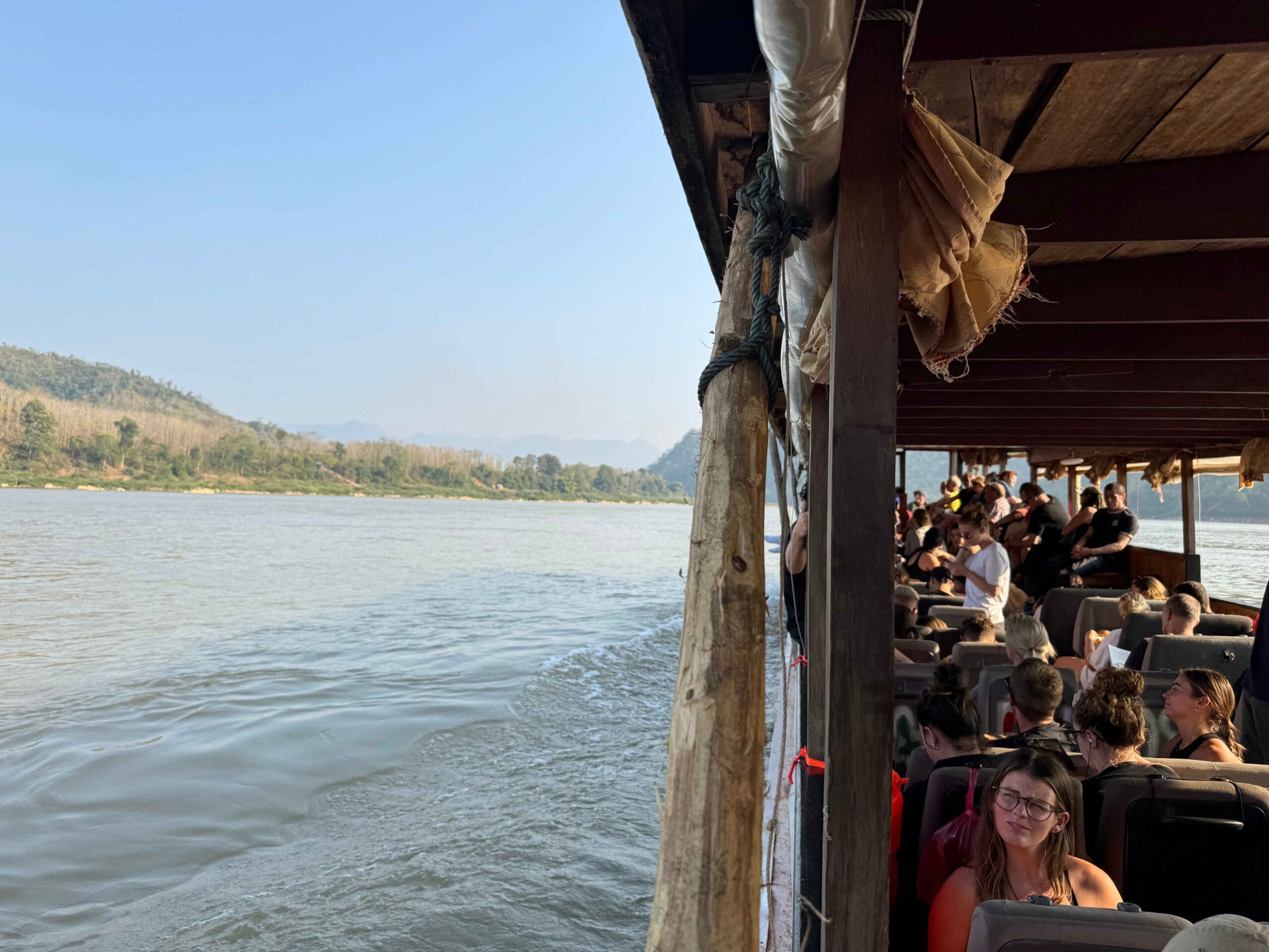 slow boat to luang prabang view on water