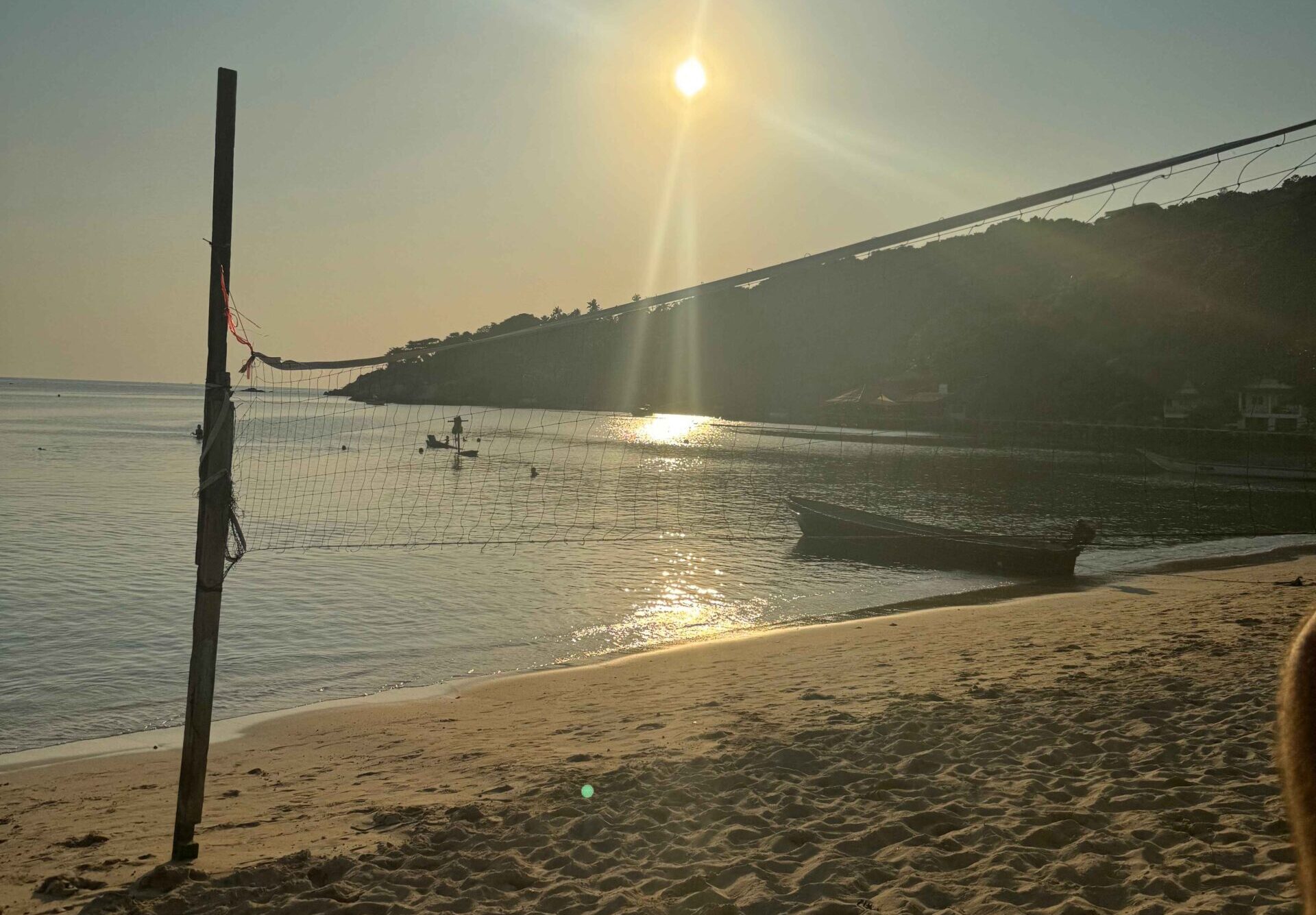 Chalon Baan Kao Beach - best beaches on Koh Tao. Volleyball net on the beach at sunset