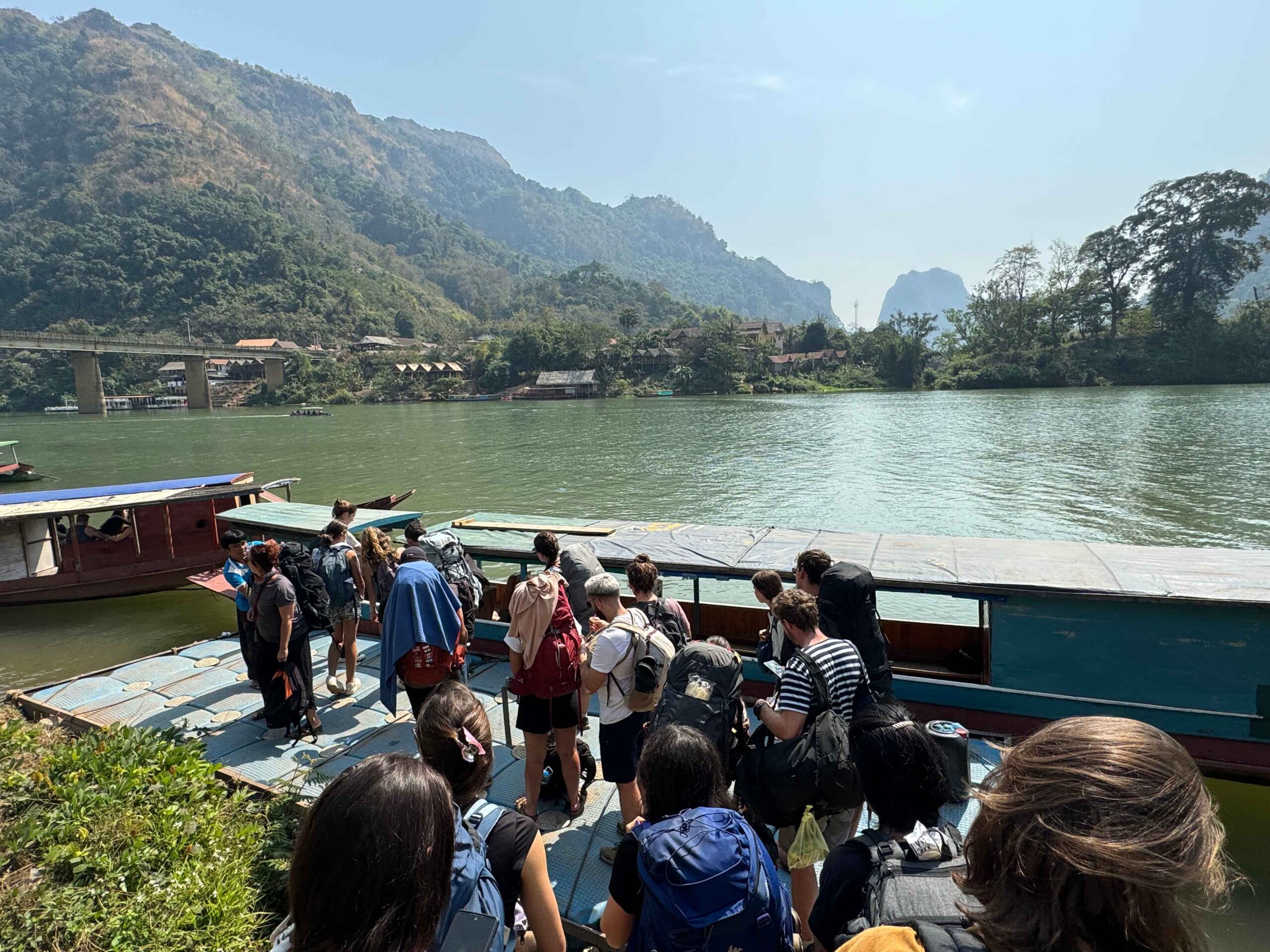 line of crowds to board the boat to Muang Ngoy