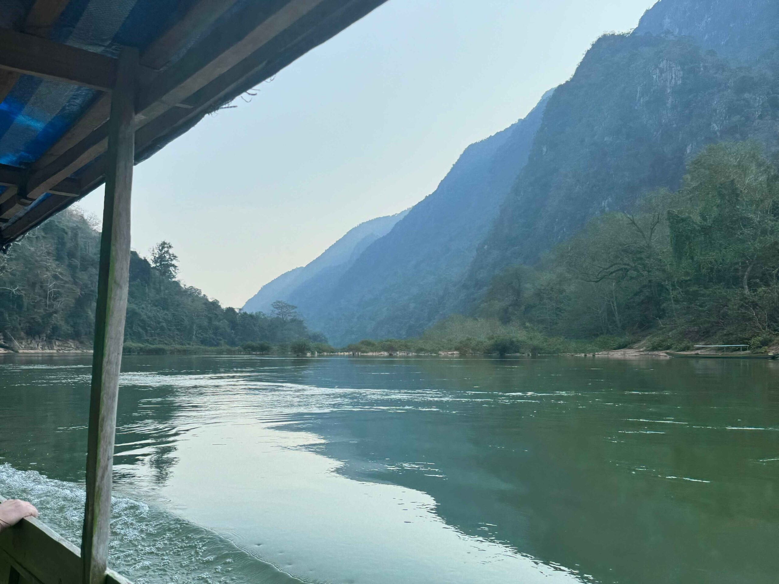 Boat ride with mountains in the background