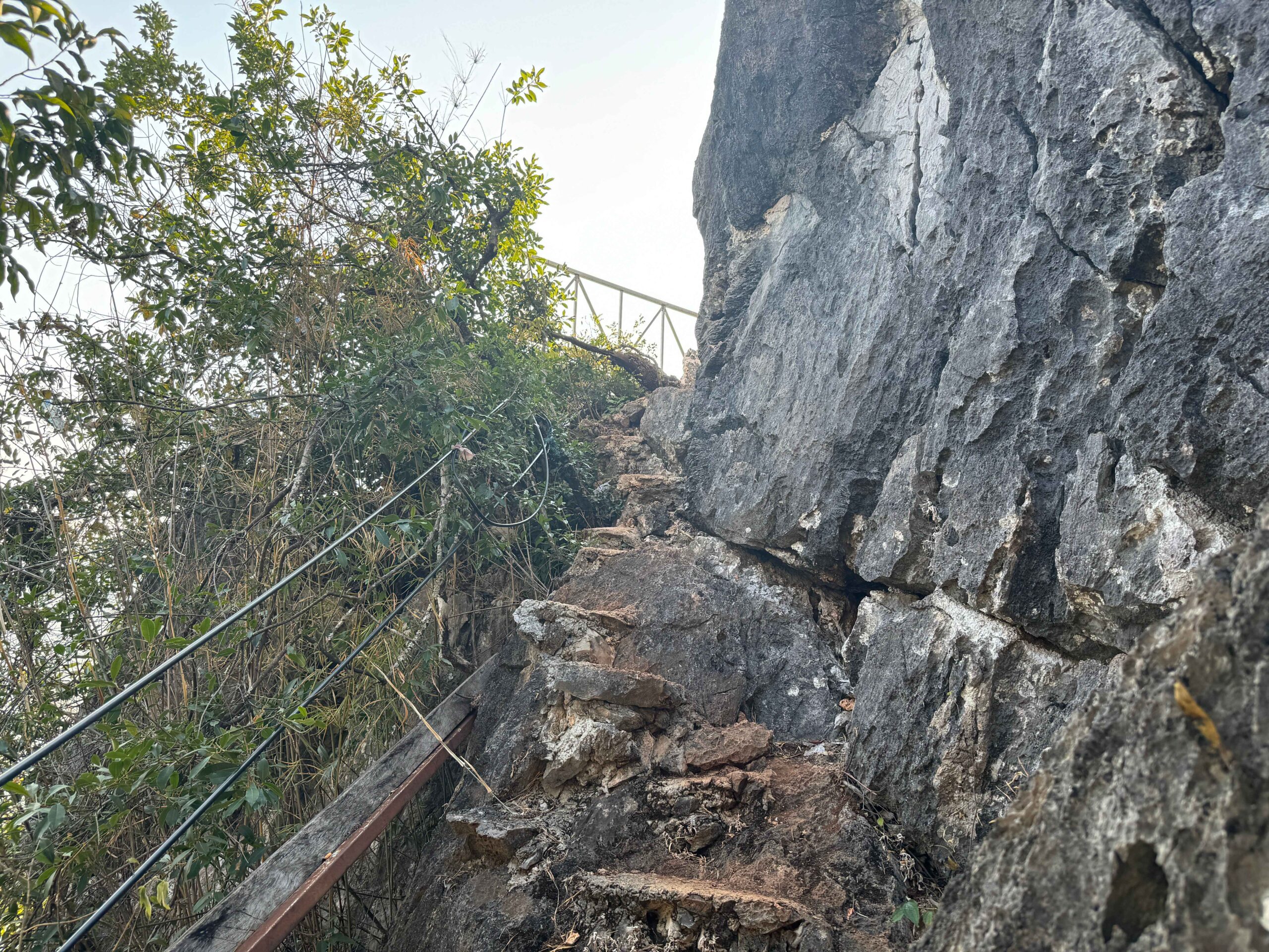 rock scramble during hike to see viewpoints in nong khiaw