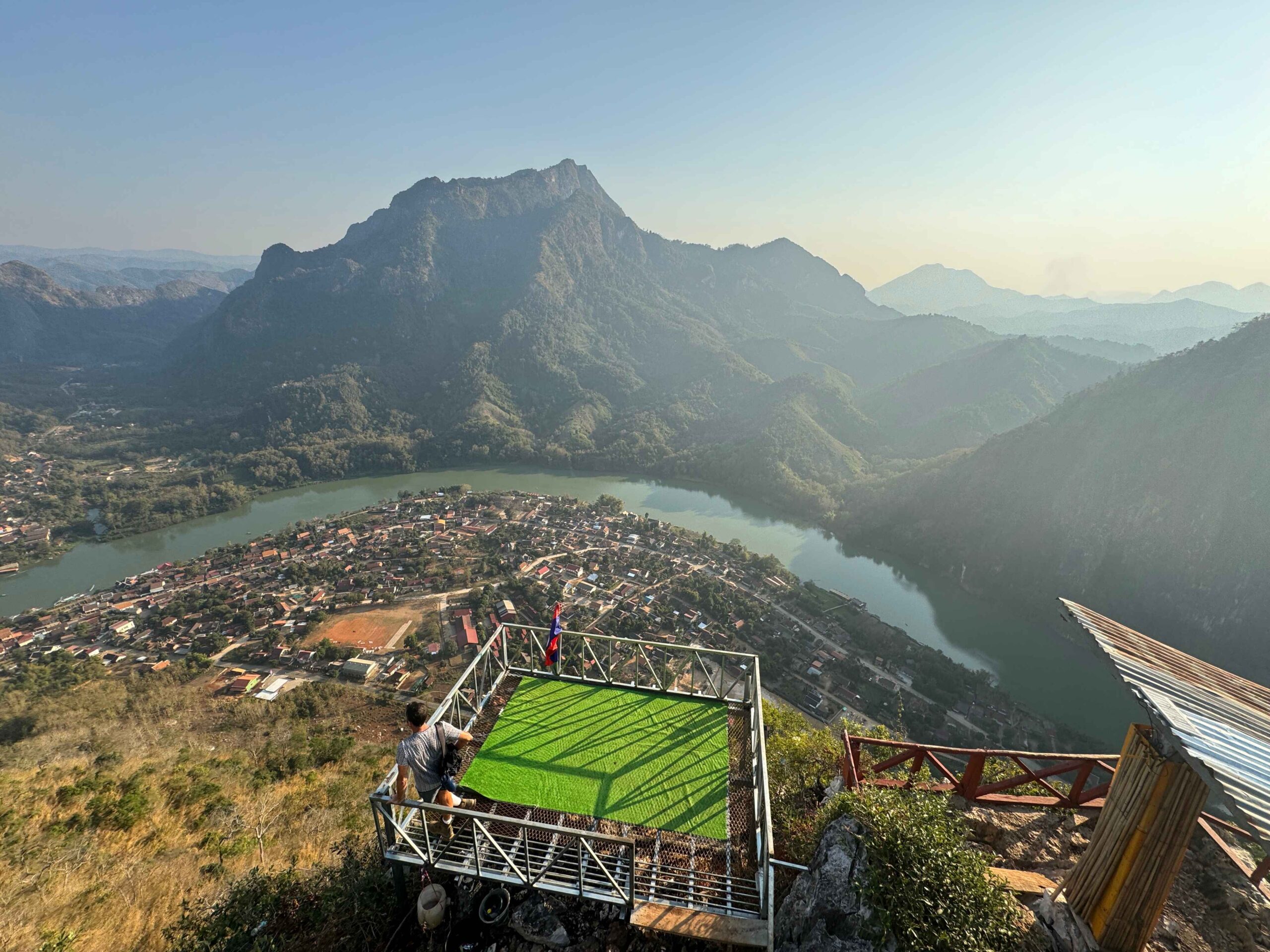 viewpoint with standing platform, mountain, and river